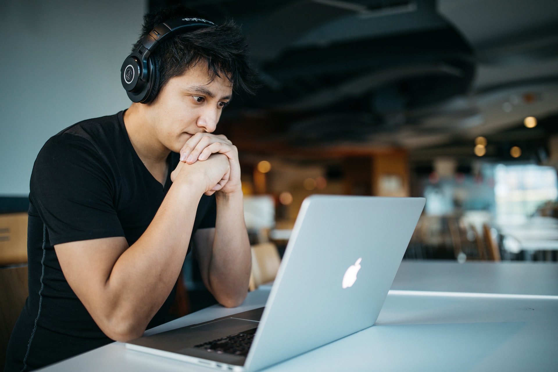 guy reading on a laptop