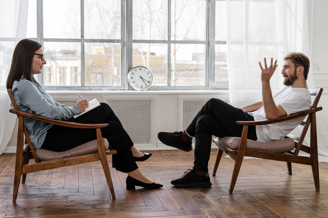 patient talking to a therapist