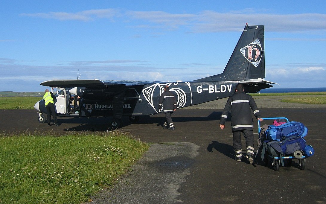 loading luggage at Papa Westray Airport in Scotland
